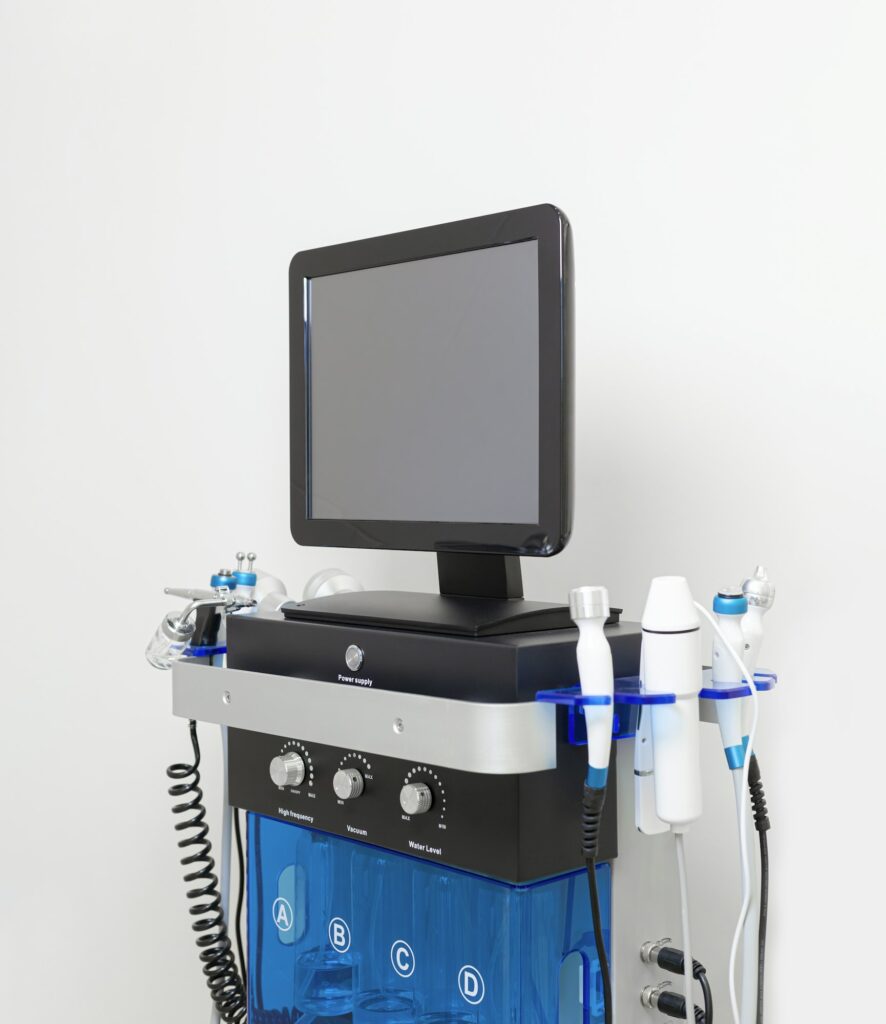 Facial skin care machine in spa clinic for anti-aging or acne treatment